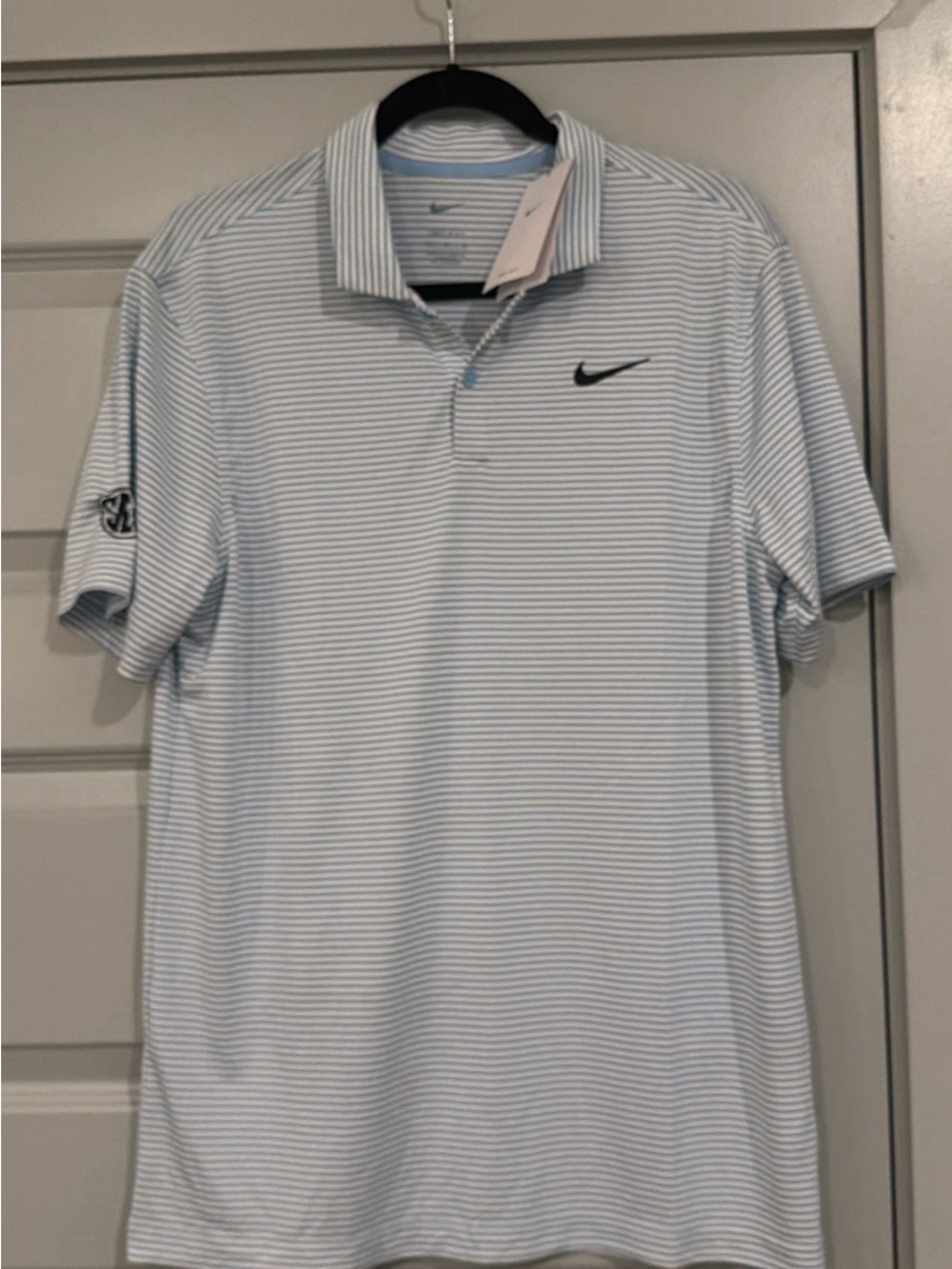 Nike Men’s Light Blue and White Striped Polo Shirt